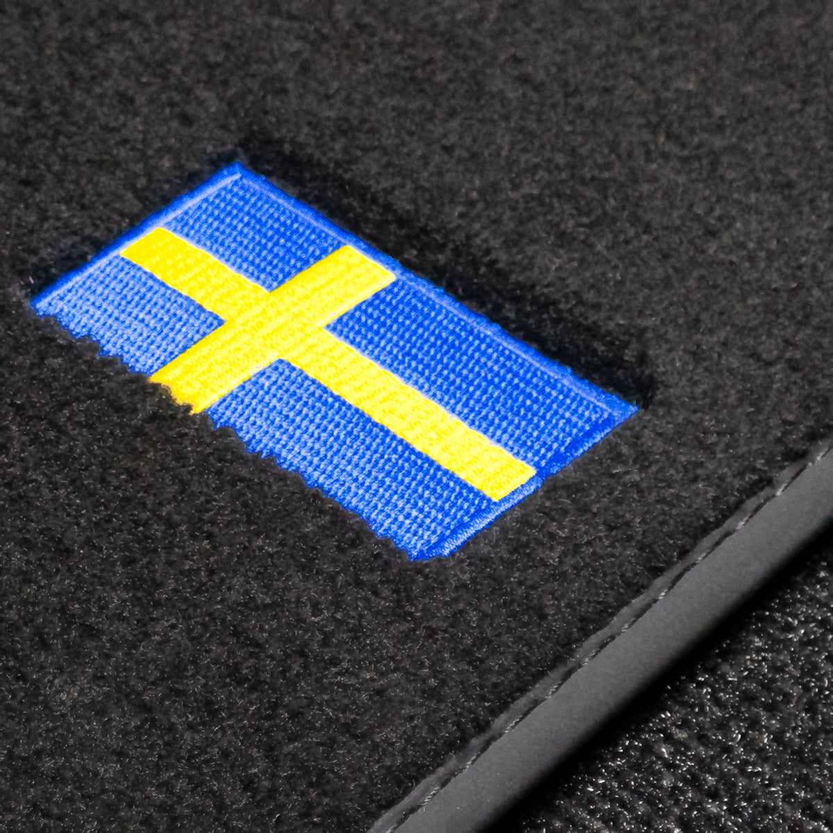 Dywaniki welurowe do Volvo C30 2006-2013 – SWE Logo
