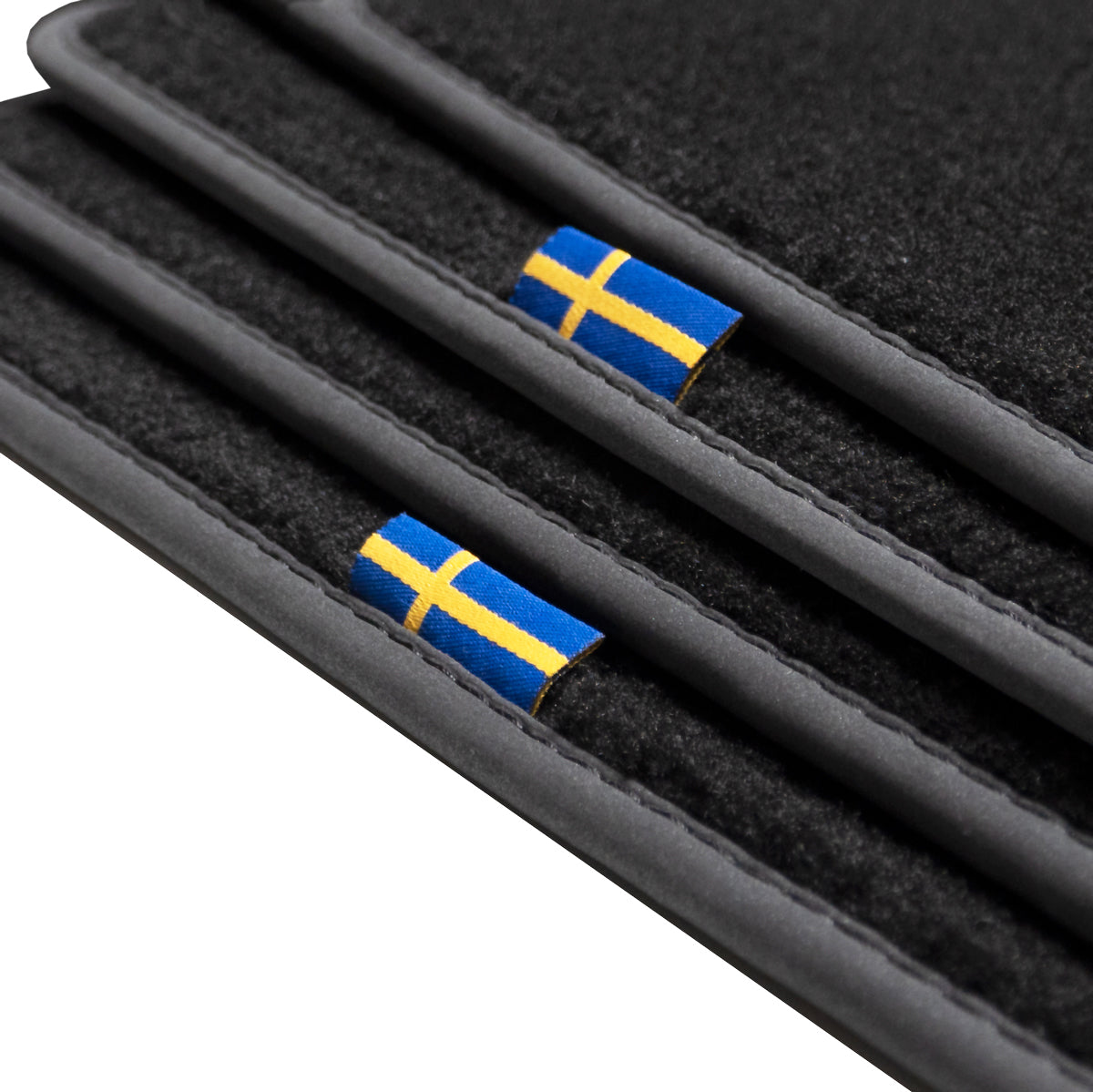 Dywaniki welurowe do Volvo 740/760 - 1981-1992 – metka z flagą Szwecji